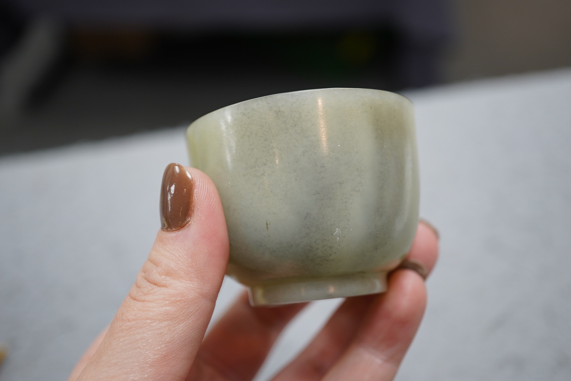 A Chinese pale celadon jade cup, 18th / 19th century